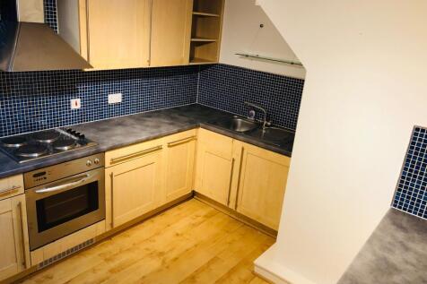 Large kitchen with fitted dishwasher, washing mach