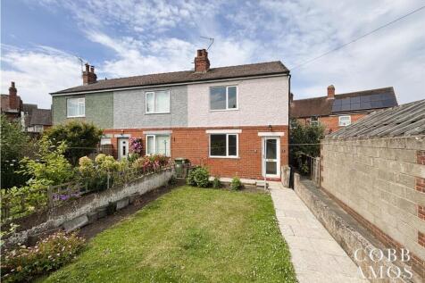 10 Front with garden.JPG