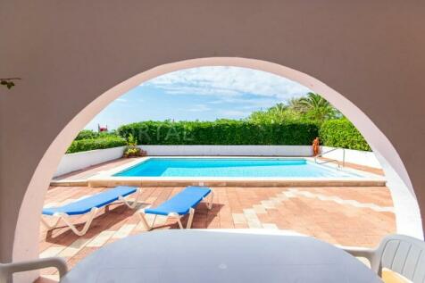 Covered terrace of villa with sea views and pool in S&#39;Algar