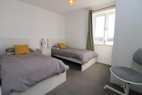 SECOND BEDROOM