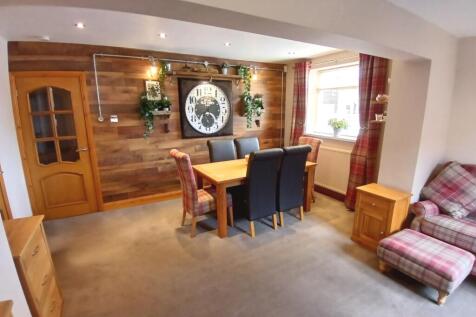 GARDEN ROOM THROUGH TO DINING ROOM