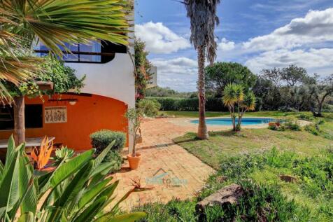 lawns surrounding pool