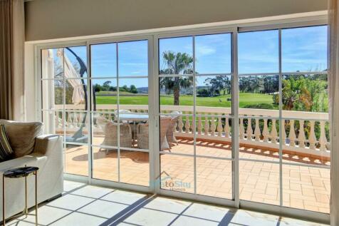 patio doors to wide balcony