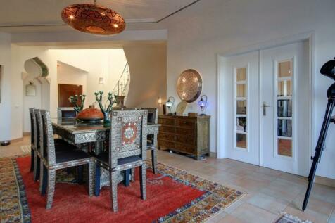 dining room with glass doors to office