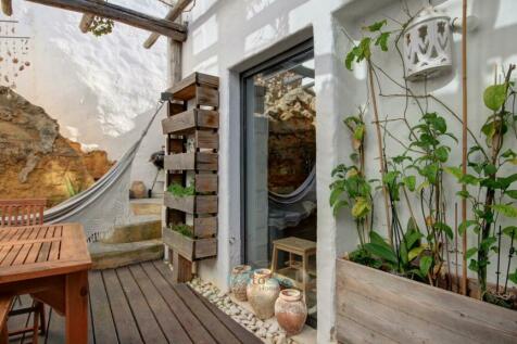 herb gardens and large kitchen window