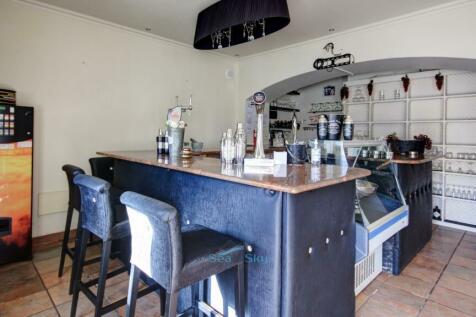 bar with display fridge