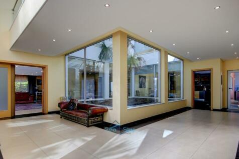 central atrium &amp; doorway to lounge