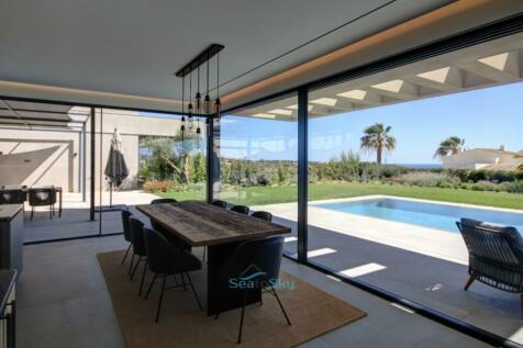 dining area overlooking pool