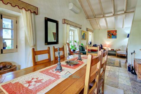 vaulted ceiling with wooden beams