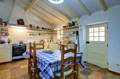 kitchen with door to covered terrace