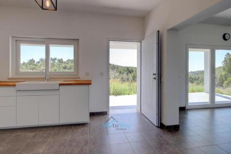 bright and airy kitchen to dining area