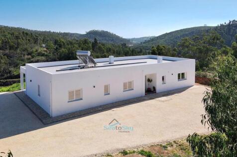 fully tiled roof with solar panel and water heater