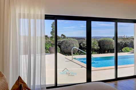large patio doors to the pool