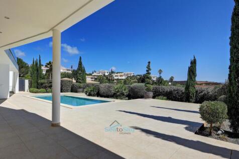 covered terrace beside the pool