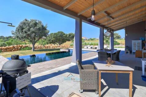 out of kitchen to terrace for indoor-outdoor entertaining