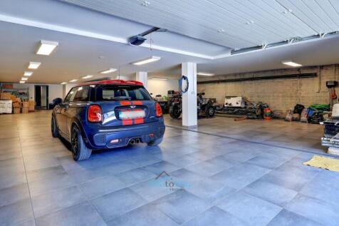 fully tiled garage for 6 cars