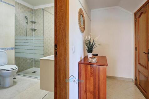 under stairs cupboard and bathroom
