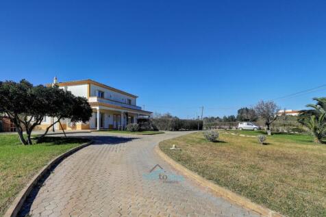 long, dual entrance driveway