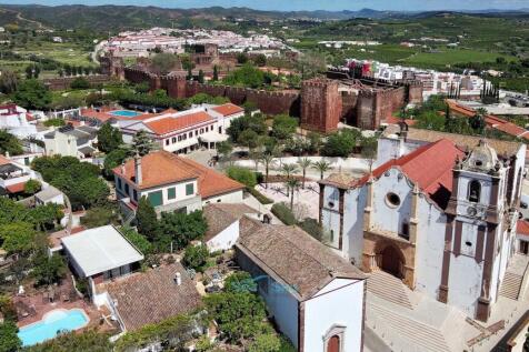 steps from church and castle