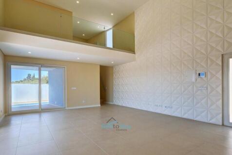 living room with mezzanine