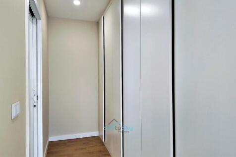 dressing area with built-in wardrobes