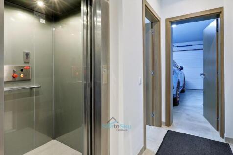 elevator, utility room and garage