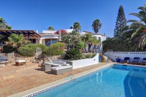 villa with heated pool