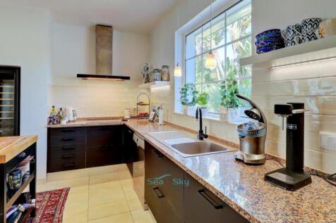 modern kitchen with granite worktop