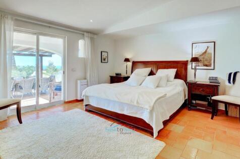 master bedroom with patio door to terrace