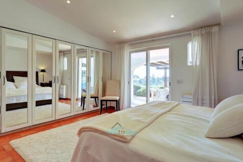 master bedroom with built in wardrobes