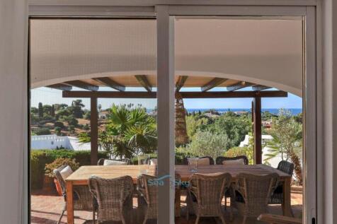 patio doors lead to the covered terrace