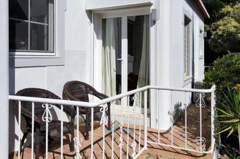 with a private balcony