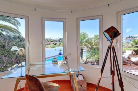 beautiful view over garden, pool and to the sea