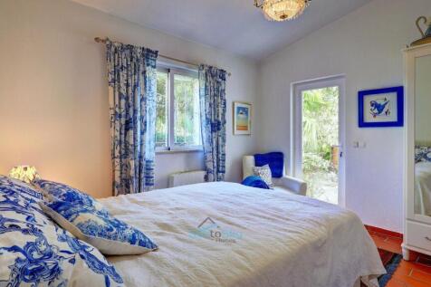 bedroom 4 with glass door to outside