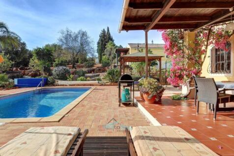 patio door leads to swimming pool terrace