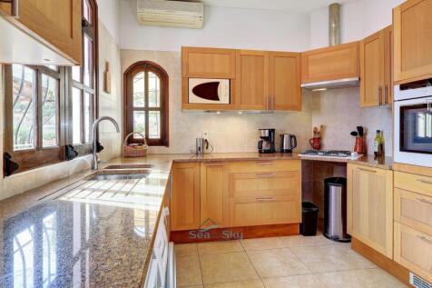 fitted kitchen with a granite worktop