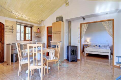 open plan space with central log burner