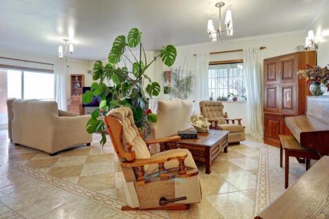 space for a living area and sitting area