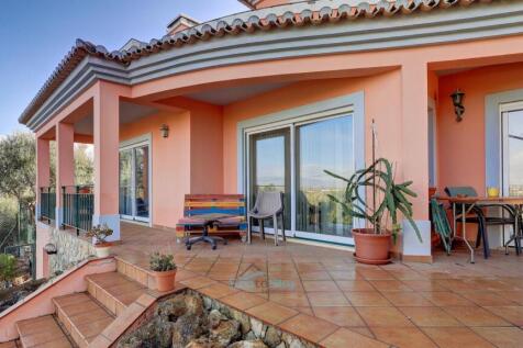 terrace off of living, dining and kitchen