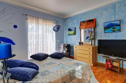 with patio door to small balcony