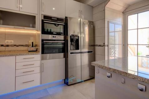 door to courtyard with steps to roof terrace