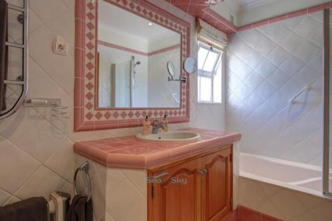 bath with shower over