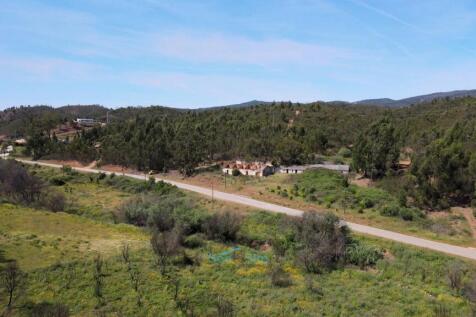 surrounded by rolling hills