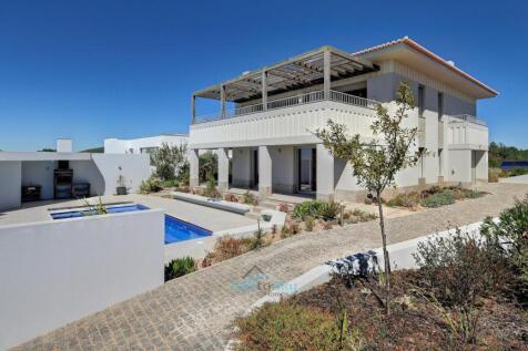 driveway, pool and house