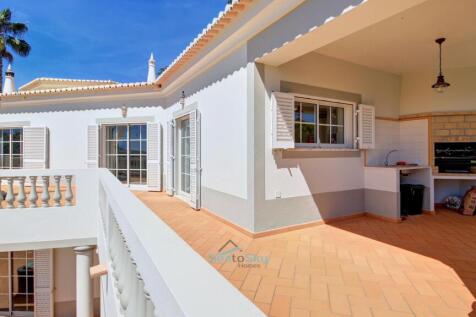 covered barbecue terrace next to the kitchen
