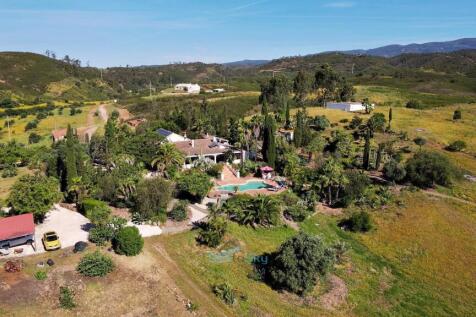 house, carport and water tank