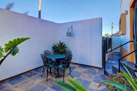 path to garden and gate to parking