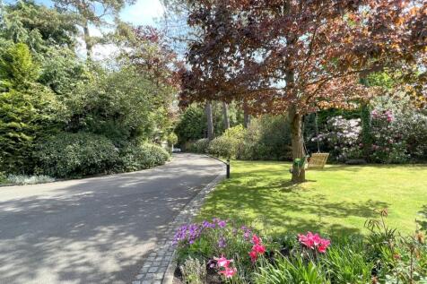 Private driveway and front garden