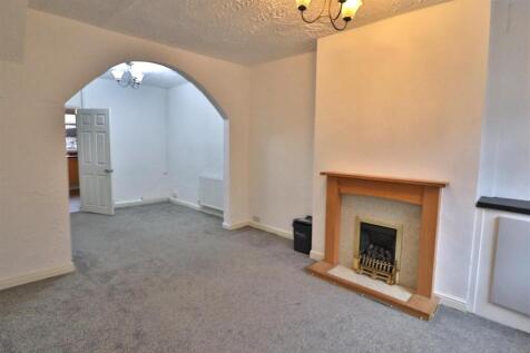 OPEN PLAN LIVING AND DINING ROOM