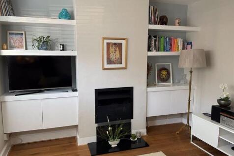 Sitting room towards fireplace 